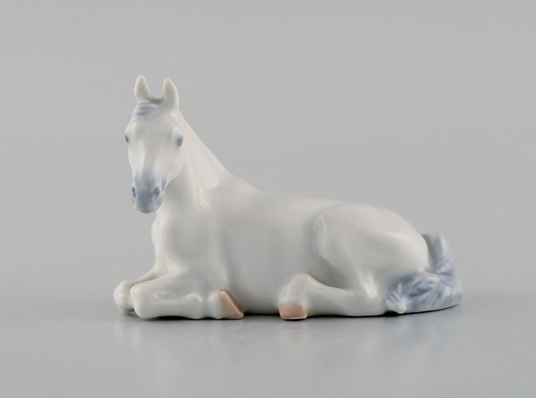 Jeanne Grut for Royal Copenhagen. Rare porcelain figurine. White foal. 1960s. 
Model number 4882.
