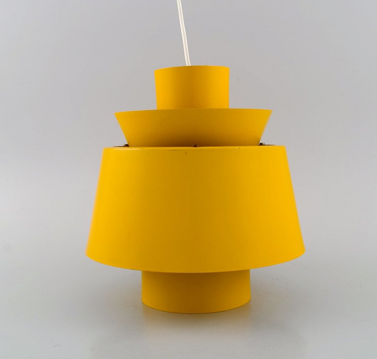 Presumably Jørn Utzon for Louis Poulsen. Retro ceiling lamp in yellow lacquered 
metal. Danish design, 1960s / 70s.
