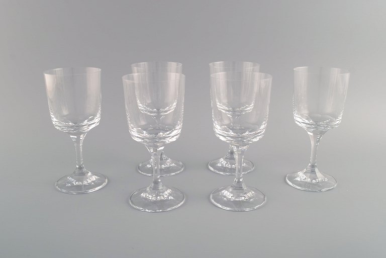 Six René Lalique Chenonceaux red wine glasses in clear mouth-blown crystal 
glass. Mid-20th century.
