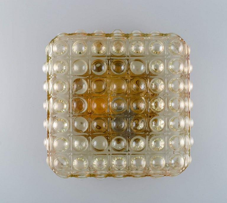 Helena Tynell (b. 1918, d. 2016) for Limburg. Ceiling / wall lamp in art glass 
and brass. Finnish design, 1970s.
