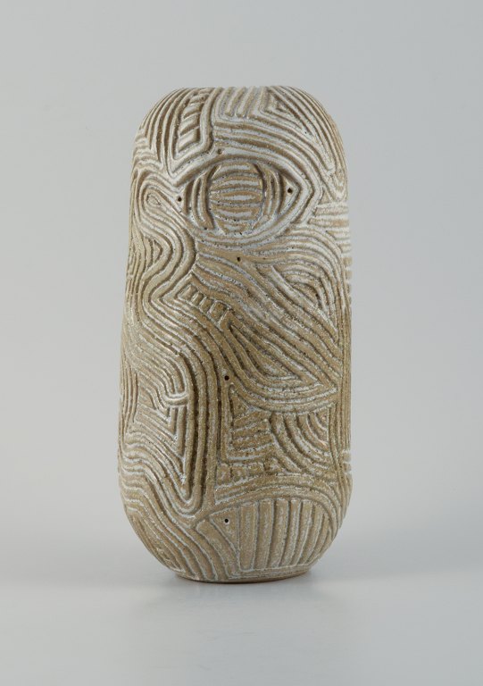 Christina Muff, Danish contemporary ceramicist (b. 1971). 
Unique, handcarved vase in stoneware clay. Covered in a shiny, semi transparent 
glaze with white flakes.