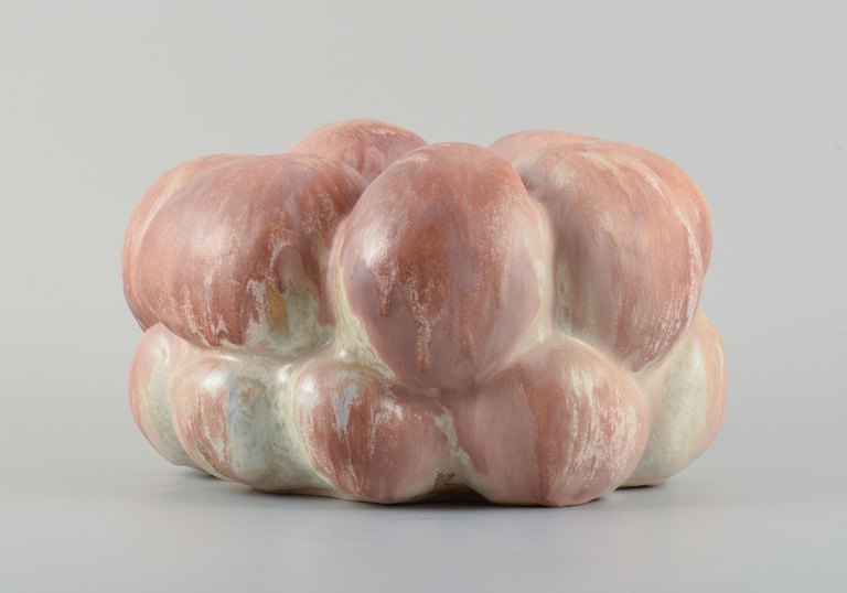 Christina Muff, Danish contemporary ceramicist (b. 1971). 
Large organic shaped vessel. This piece is unique and hand modelled. Cream, 
peach, rose and soft blue are some of the colours you will find in the glaze.