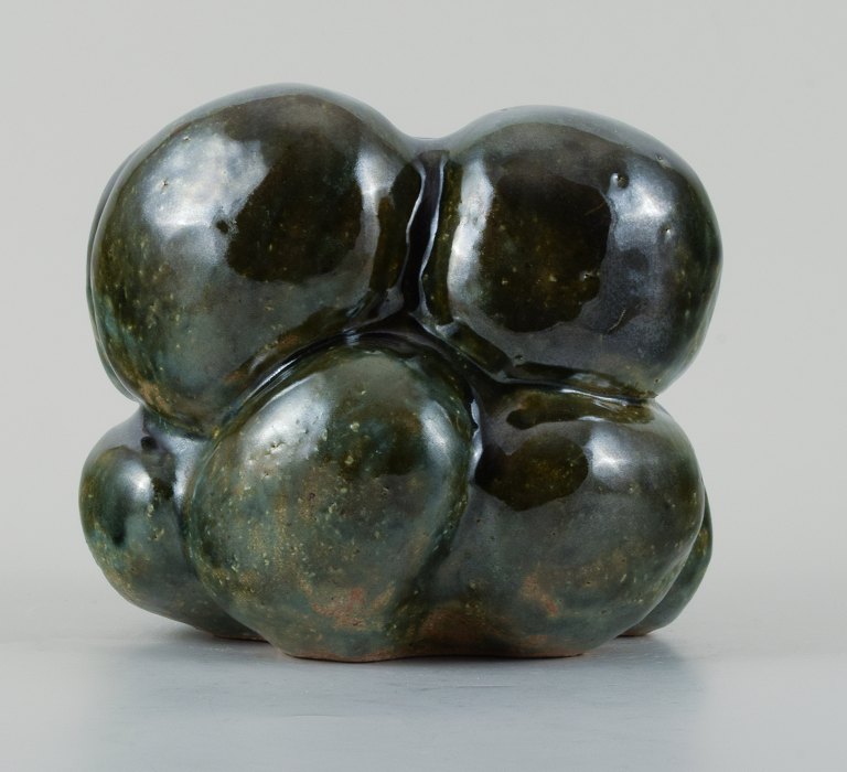 Christina Muff, Danish contemporary ceramicist (b. 1971). 
Organic shaped vessel glazed with shiny green glaze. Made from coarse, 
repurposed stoneware clay.