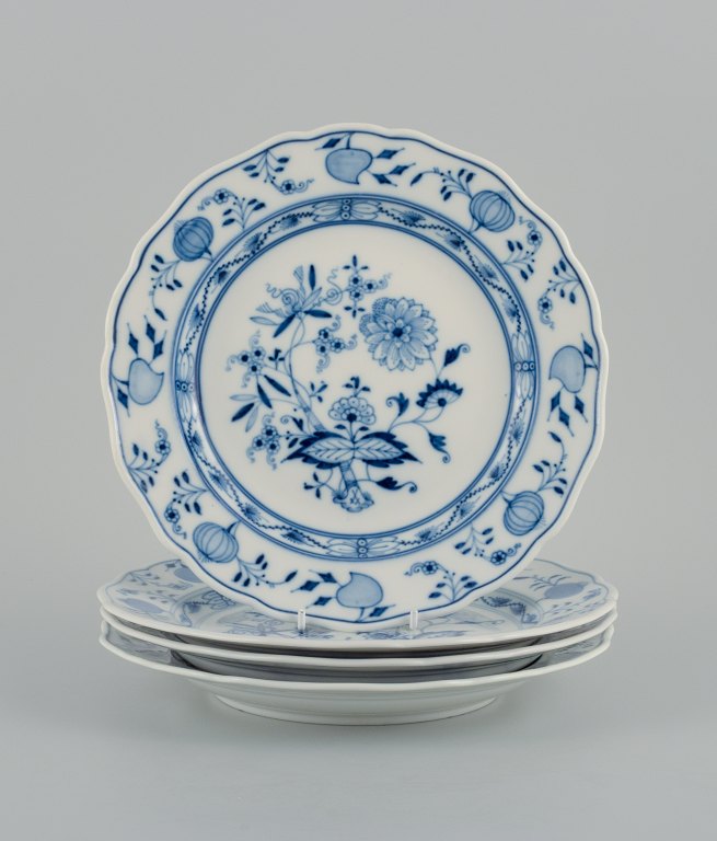 Meissen, a set of four Blue Onion dinner plates.