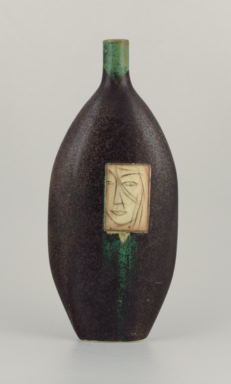 Pirjo Nylander, Finnish ceramist, tall unique ceramic vase with motif of a 
woman