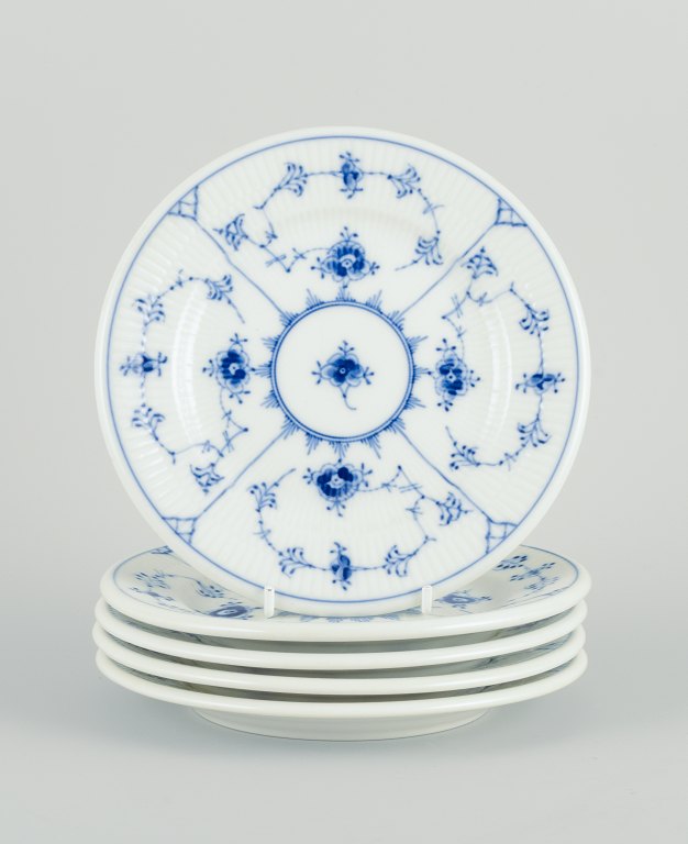 Five Royal Copenhagen Blue Fluted Plain plates in hand-painted porcelain.