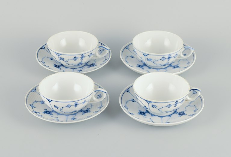 Four sets of Royal Copenhagen Blue Fluted Plain tea cups and saucers in hand 
painted porcelain.