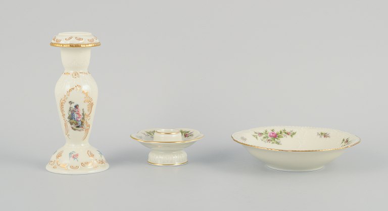 Rosenthal, Germany. "Sanssouci", two candlesticks and a small bowl decorated 
with flowers and gold decoration.