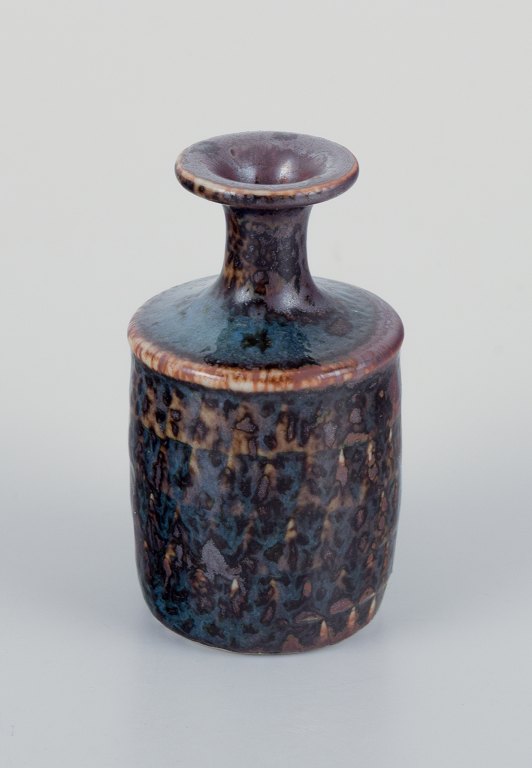 Stig Lindberg (1916-1982), Gustavsberg - Studio Hand, miniature vase with glaze 
in violet and brown tones.