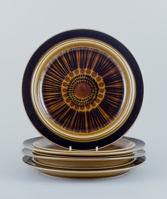 A set of four Arabia "Kosmos" dinner plates in stoneware.