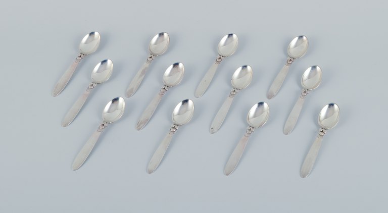 Georg Jensen, Cactus, a set of twelve sterling silver coffee spoons.