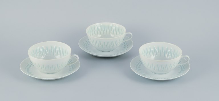Friedl Holzer-Kjellberg for Arabia,  Finland, three pairs of large tea cups with 
saucers in rice porcelain.