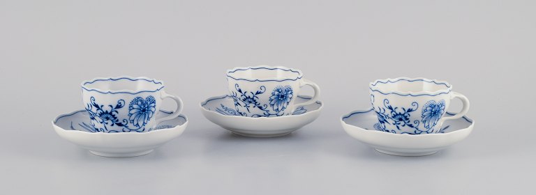 Meissen, Germany, three onion pattern coffee cups with saucers.