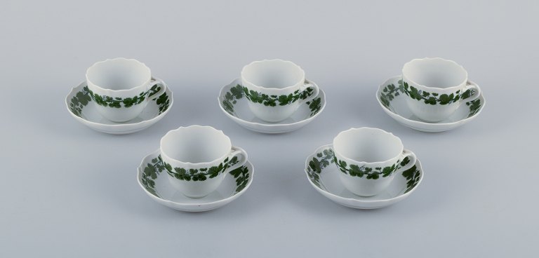 Meissen, Germany, Green Ivy Vine, a set of five demitasse cups with matching 
saucers. Hand-painted.