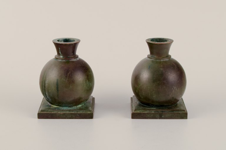 GAB, Sweden. A pair of Art Deco solid bronze candle holders.