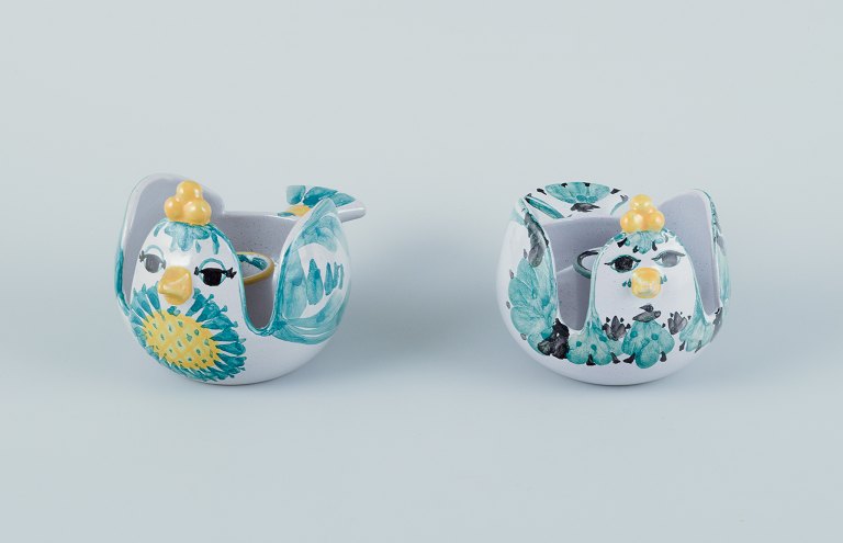Bjørn Wiinblad (1918-2006) for Det Blå Hus (The Blue House), Denmark. A pair of 
candle holders shaped like birds. Glazed in green and yellow tones.