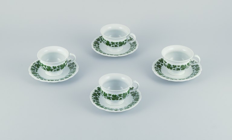 Meissen, Germany, Green Ivy Vine, a set of four large coffee cups and saucers.