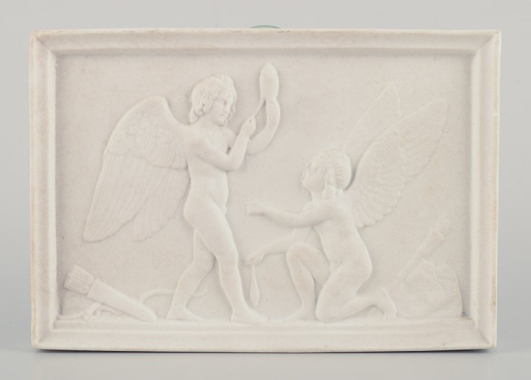 Bertel Thorvaldsen for Royal Copenhagen.  Amor and Hymen spins the thread of 
life. Biscuit relief.