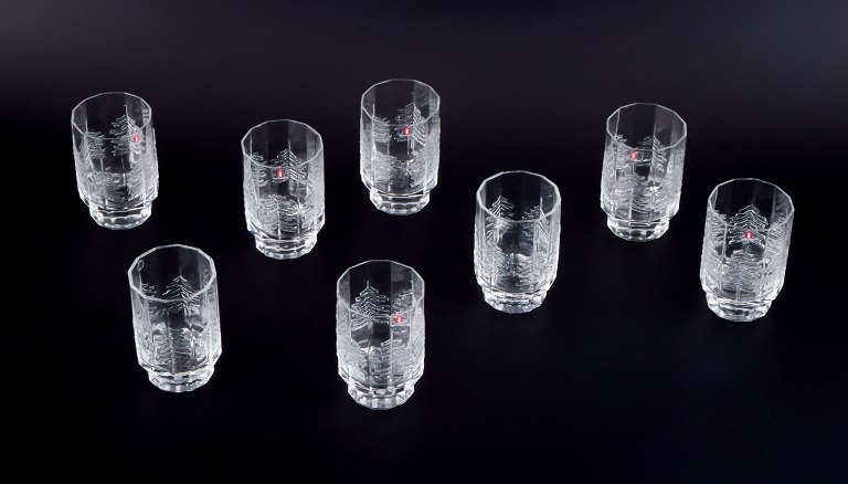 Jorma Vennola for Iittala. Eight "Kuusi" drinking glasses featuring motifs of 
fir trees.