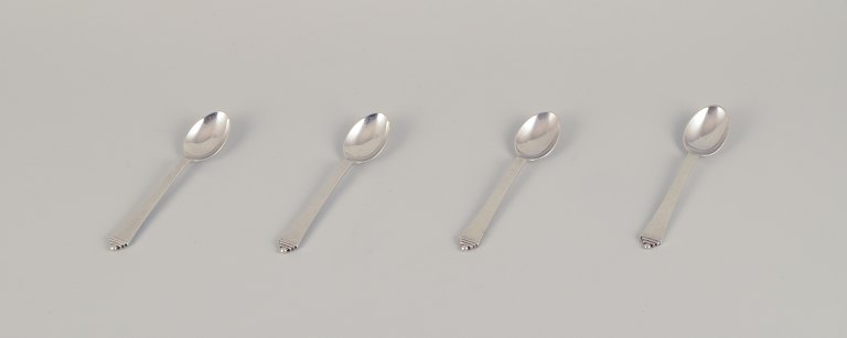 Four Georg Jensen Pyramid tea spoons in sterling silver.