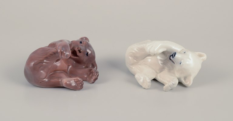 Royal Copenhagen, Danmark.
To porcelænsfigurer af liggende bjørneunger.
