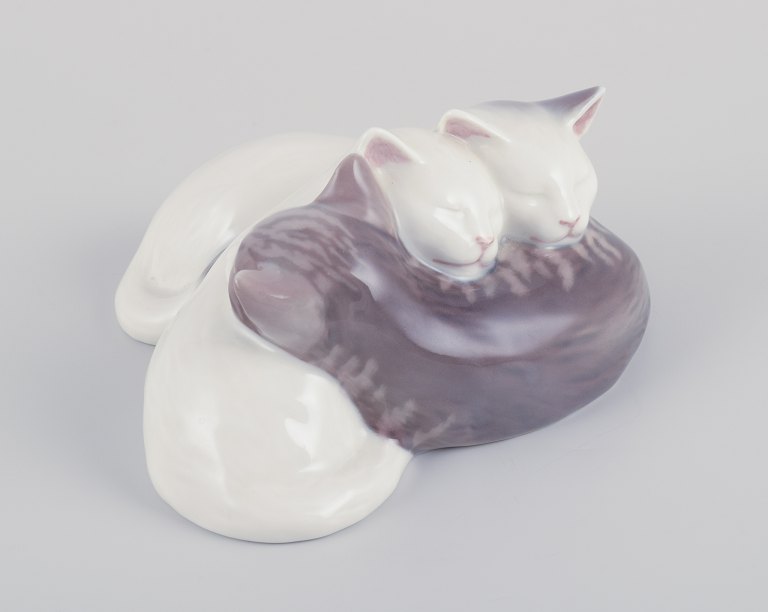 Royal Copenhagen, porcelain figurine of three sleeping kittens.