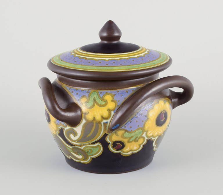 Gouda, Netherlands.
Beautifully crafted lidded jar with three handles.